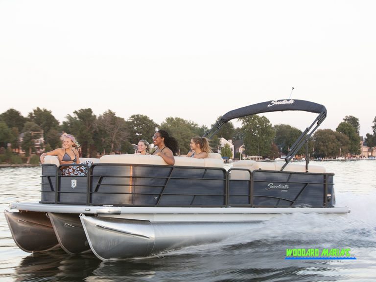 several people cruising in a sweetwater 2286 c