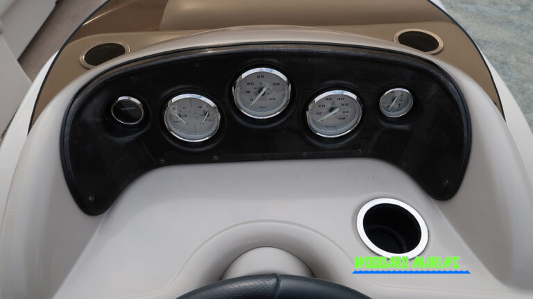 Sweetwater pontoon dashboard gauges close up used pontoon Lake George